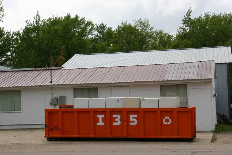 Refrigerators/freezers are corralled outside Sovenson's Appliance.