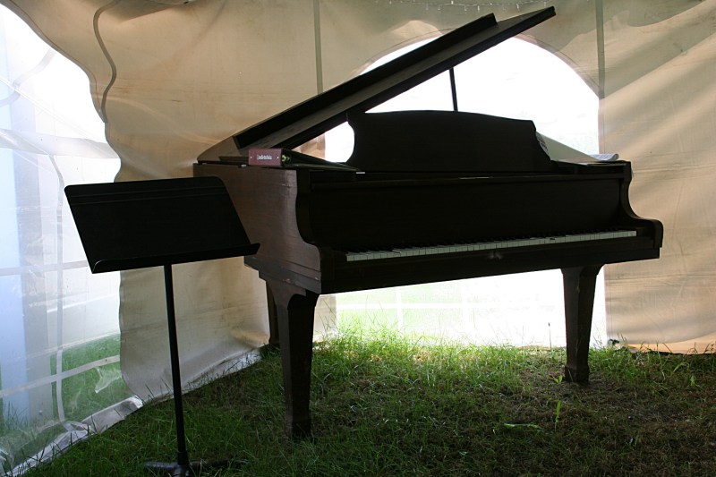 There's even a piano inside the reception tent.