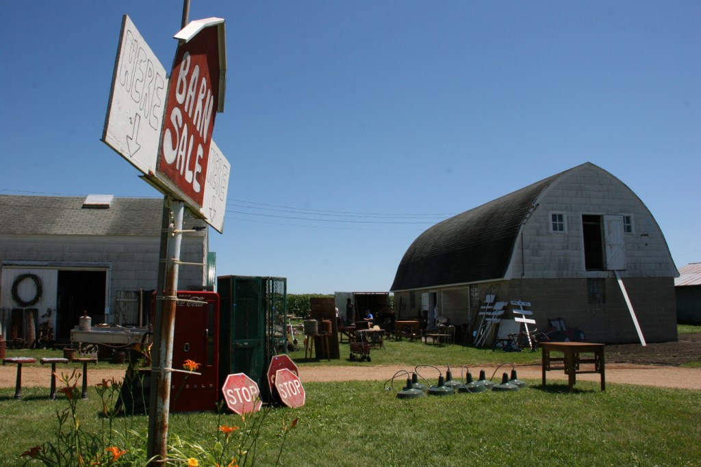 Park along the edge of the circle drive or on Frontage Road and then amble up to the Barn Sale.