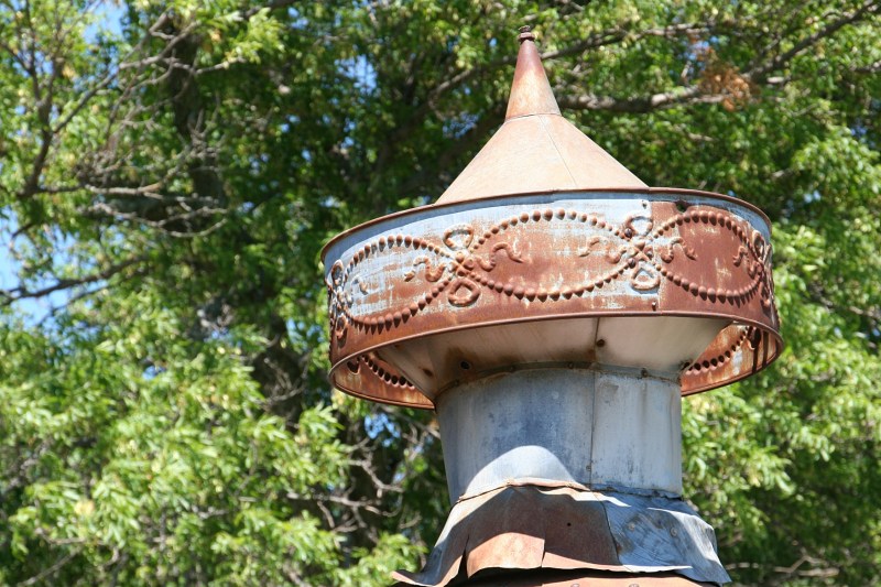 A cupola country touch on the corn crib.