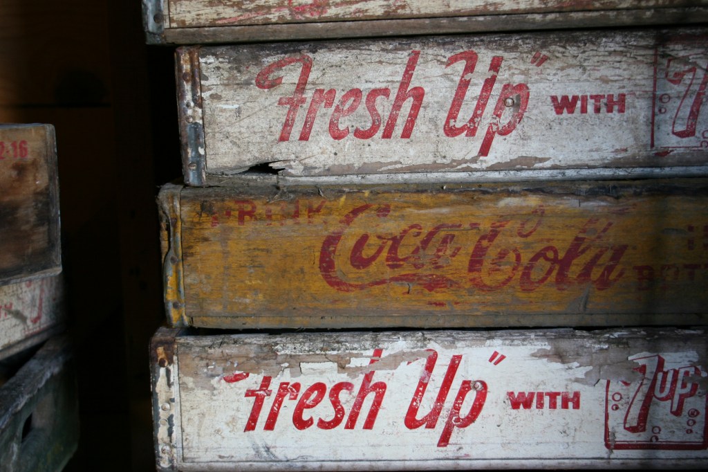 There are lots of vintage wooden pop crates for sale.