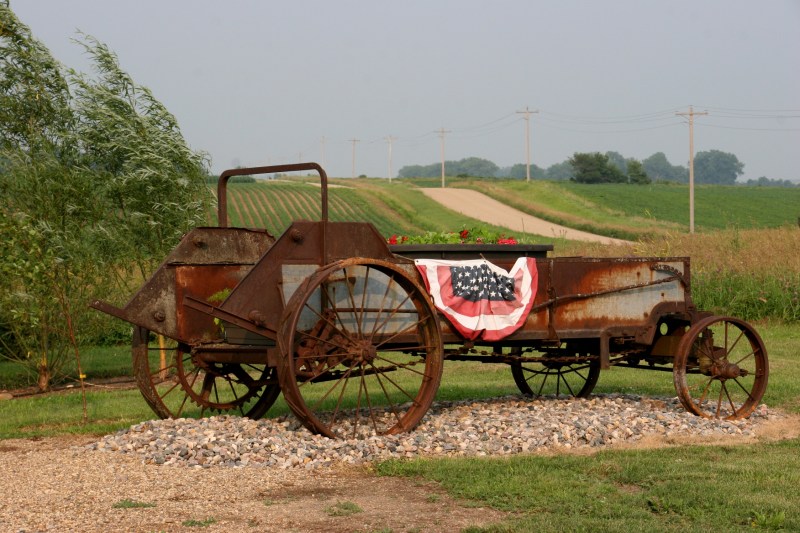 This is the old manure spreader from the farm where I grew up. My sister-in-law attached the patriotic bunting for the Fourth.