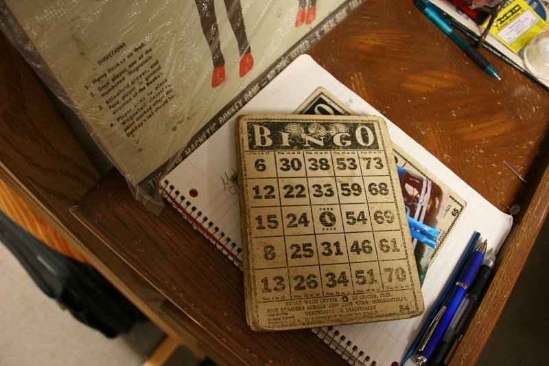 Underneath the top bingo card is the bingo card photo frame Audre crafted. And below that is a notebook where customers can jot down items they are searching for.