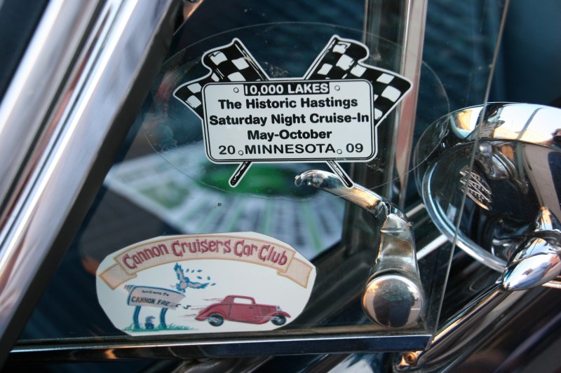 A vehicle sports stickers for area car cruises.