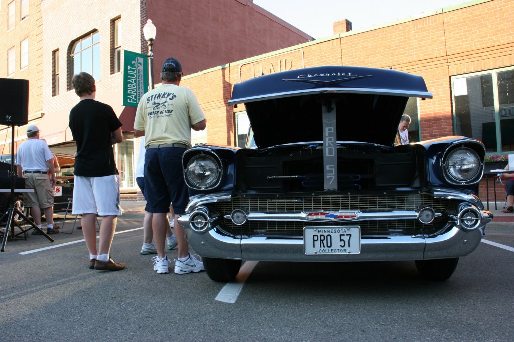 Interested in what's under the hood? Many hoods are open at car shows.