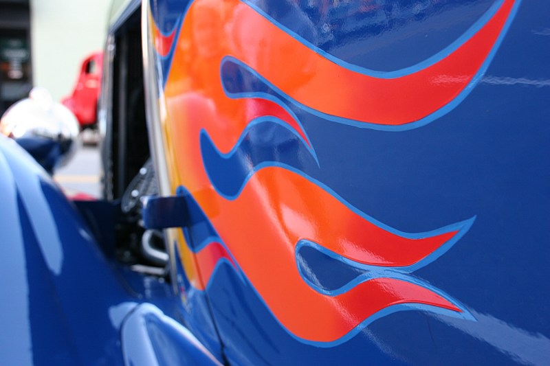 Art flames on the side of a truck.