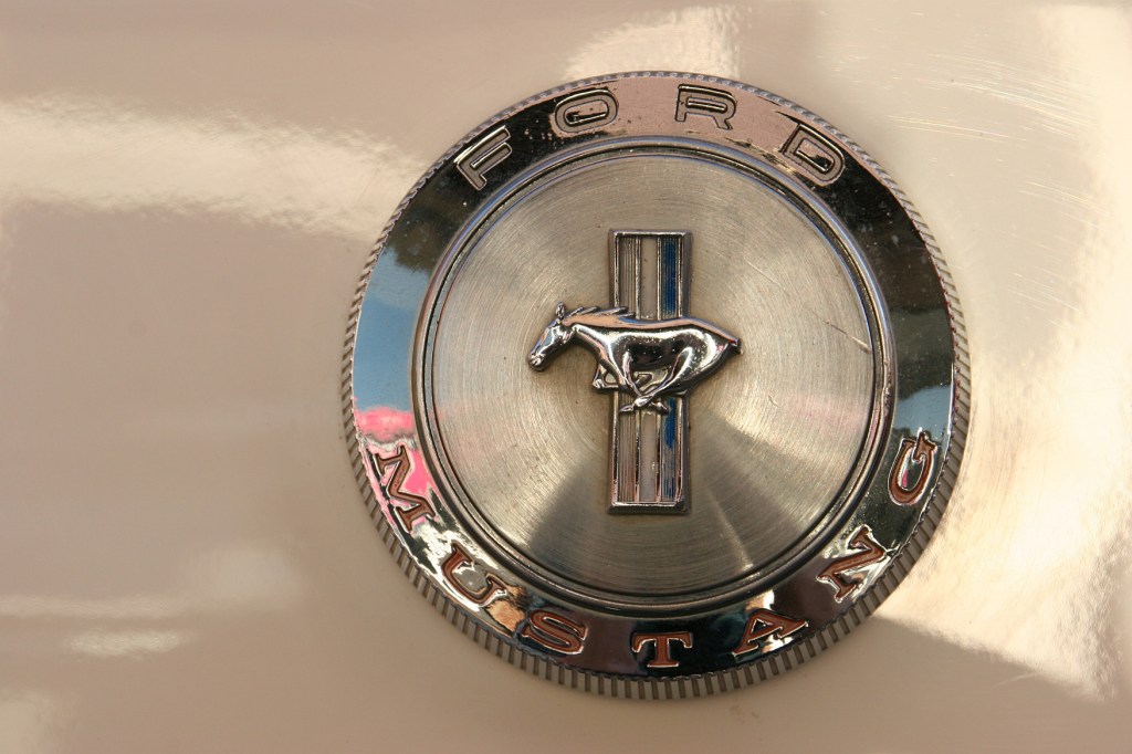 Zooming in on the details, a Mustang emblem.