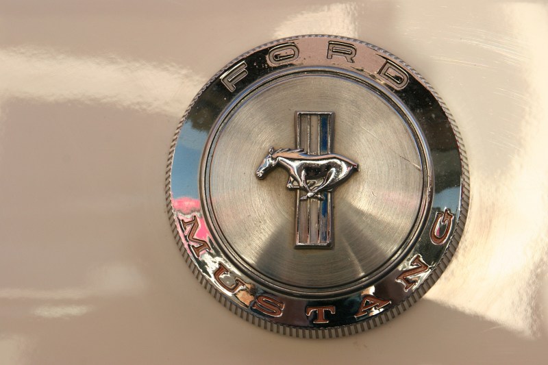 Zooming in on the details, a Mustang emblem.