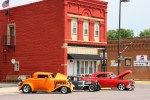 Elysian Fourth, cars in front of old&nbsp;building