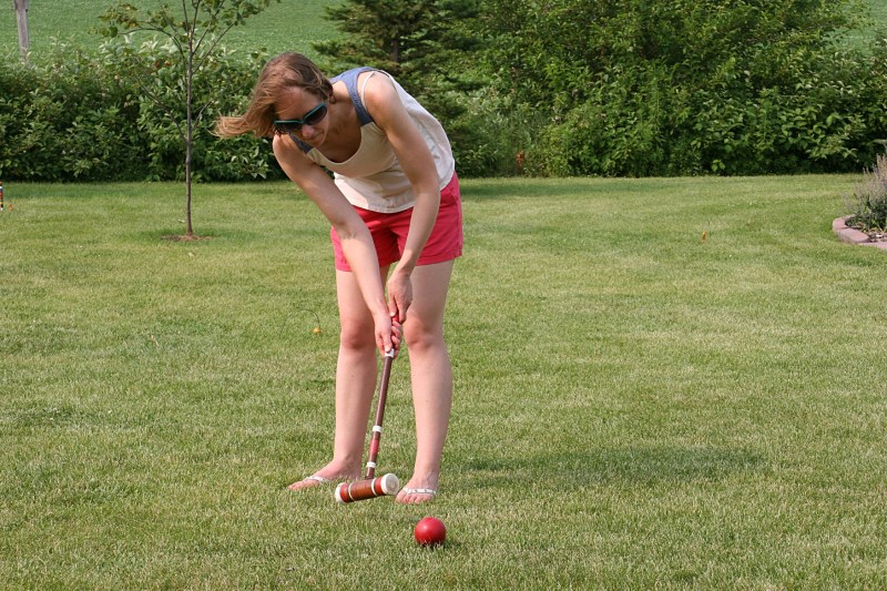 My eldest daughter takes her turn during one of many games of croquet.