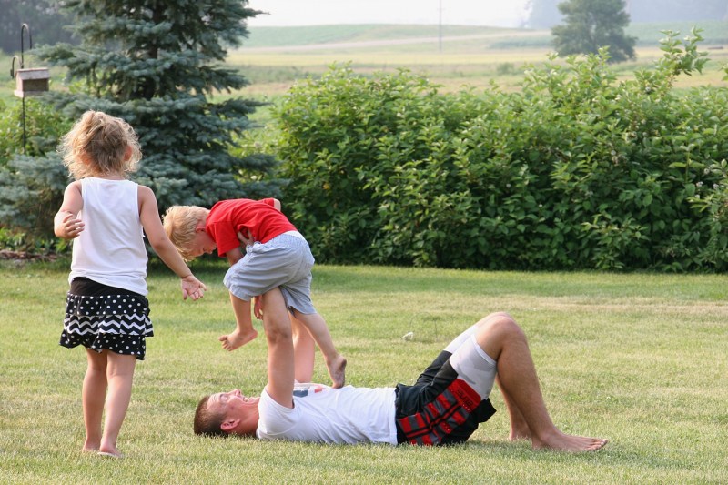 The youngest ones rough-housed with the high school student.