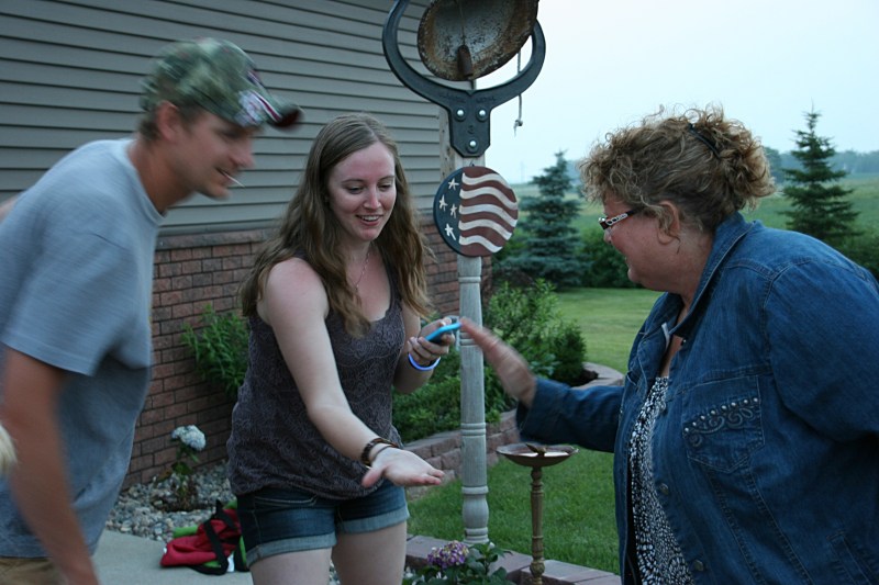 Opposing teams step up to play Family Feud.