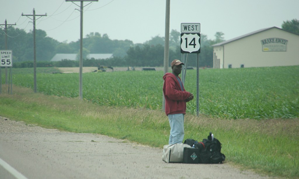 Hitchhiker at Sanborn Corners on the Fourth of July