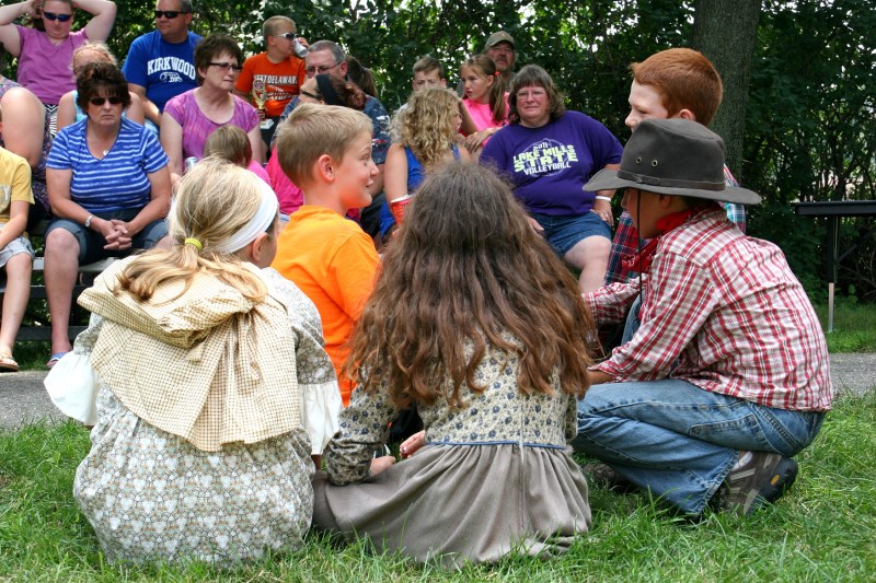 More reenactors watching.