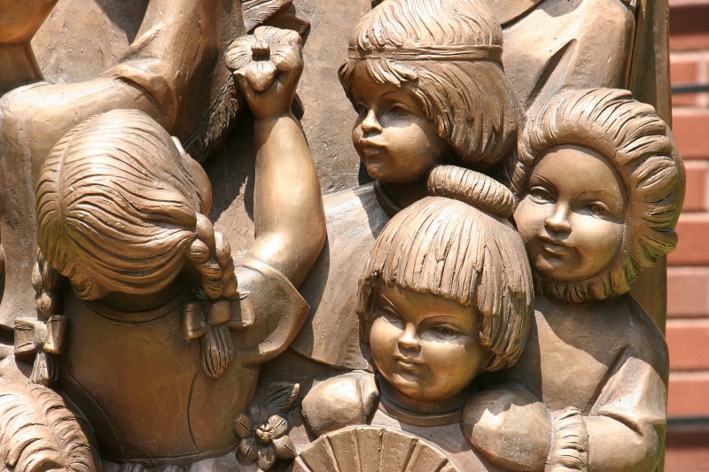 Children of many ethnicities are part of the Mary statue.