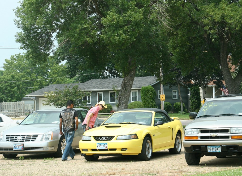 U.S. Highway 14 passes through many small towns, like Sleepy Eye where these guys were shopping for a car.