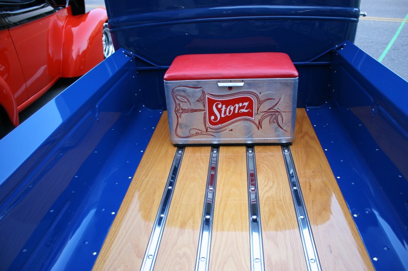 Another vintage cooler, this one in the back of a wagon.
