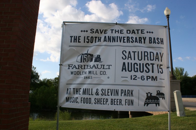 This sign outside the mill advertises Saturday's 150th anniversary festivities.