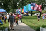 Festival, crowd near row of&nbsp;flags