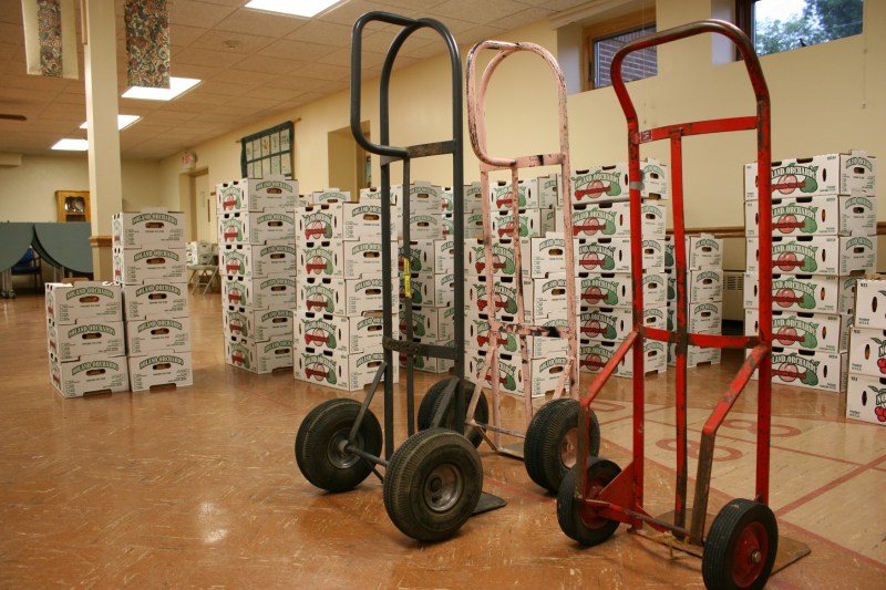 Carts are on hand to transport boxes from basement to vehicle.