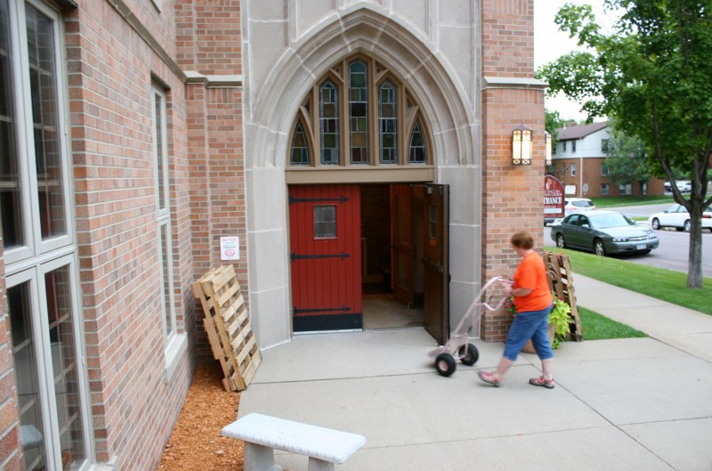 And when that task is done, back inside the volunteers go to await the next customer who has preordered a box of peaches.