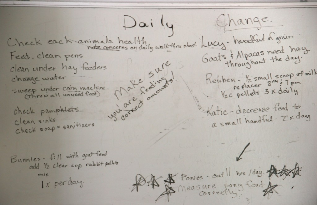 Daily instructions posted inside the barn for employees.