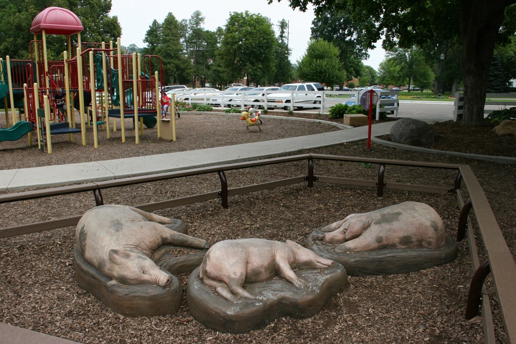 Playground pig sculptures.