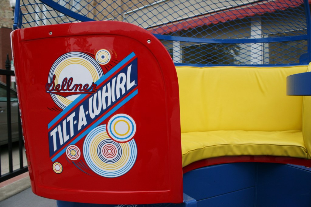 Signage and seating inside the restored amusement car.
