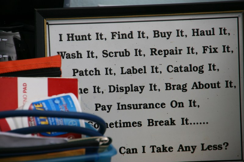 A sign posted in Woody's shop.