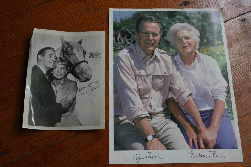 Woody pulled these autographed photos from his bulletin board. That's former President and Mrs. Bush and, to the left, Mr. Ed. Both were found tucked inside manuals he purchased.