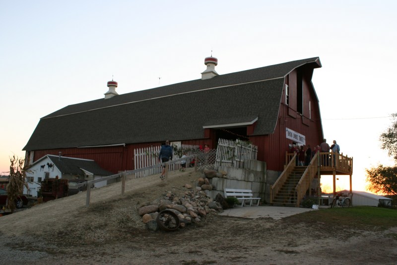 The sun sets behind John and Debbie Becker's rural Dundas, Minnesota, barn.