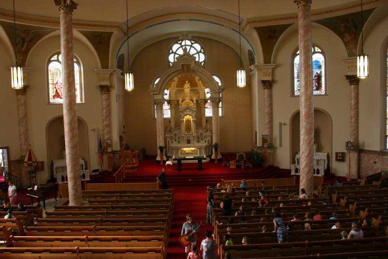 Students from the basilica's school file in for morning Mass.
