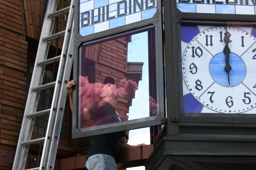 Mike Elwood at work on the clock.