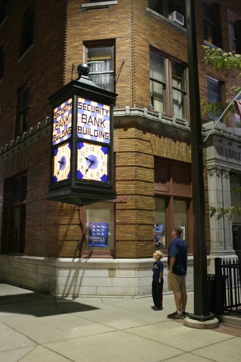 Steve and Peter McDonough check out the clock Saturday evening. 