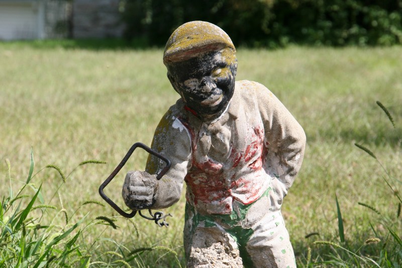 Still, I photographed this weathered art out front.