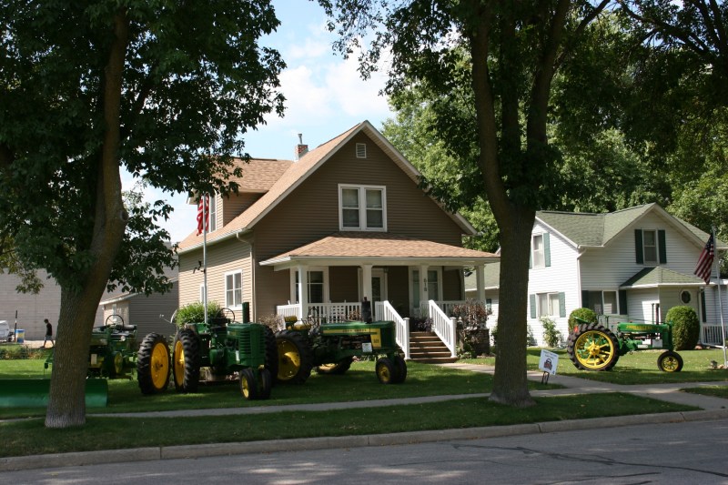 Next, I was distracted by all these John Deere tractors parked in a front yard. I don't know why.