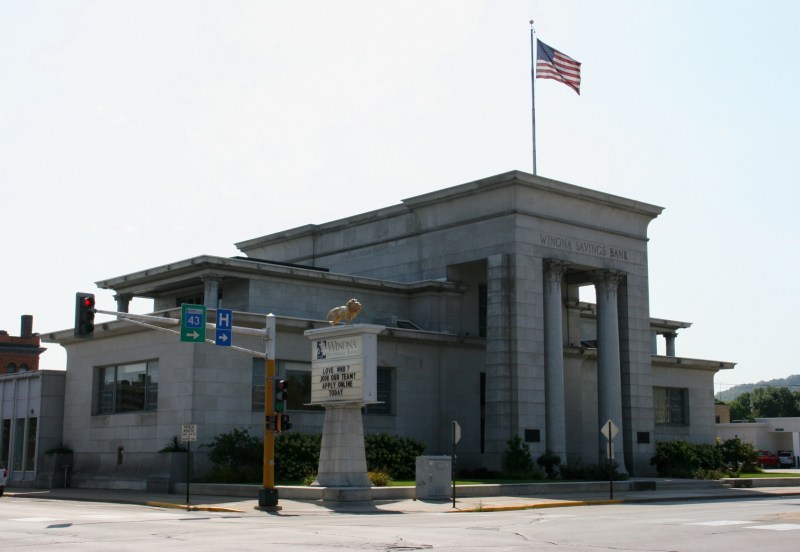 The exterior front of the Winona National Bank, originally Winona Savings Bank, presents a visual of strength and stability in design and materials.