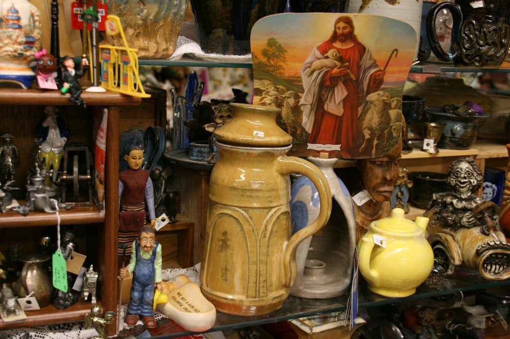 An example of Adams pottery, center, sits among other merchandise.
