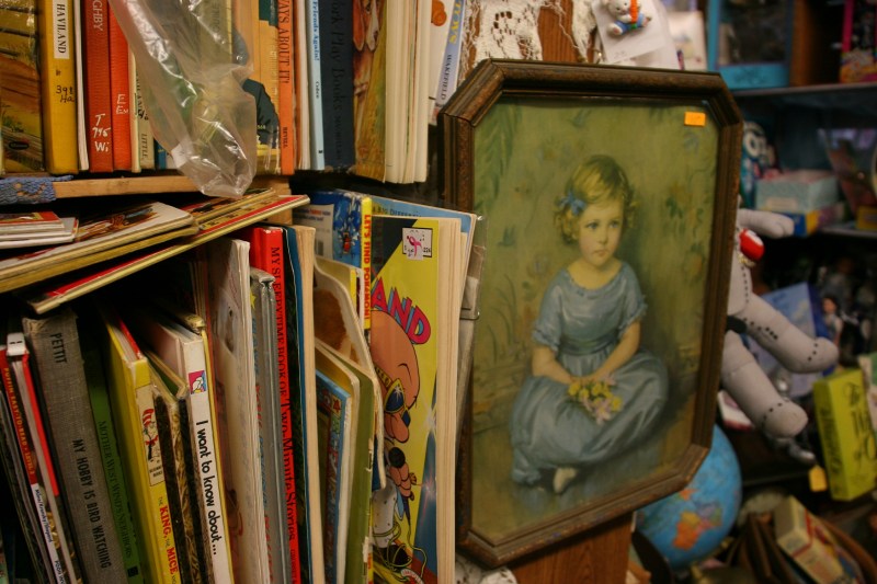 Eloise pulled this portrait off the hook so she could read the note about the date it was gifted to someone. I don't recall details. But I do remember how Eloise lovingly noted the girl's beautiful blue eyes accented by her blue dress.