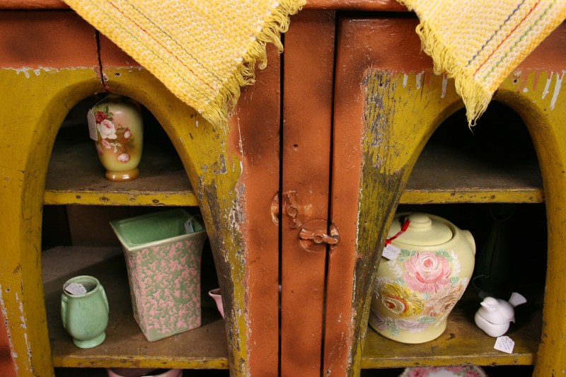 Merchandise snugged into a cabinet.