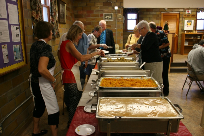Delicious home-cooked food fills roasters at Trinity's annual fall harvest dinner on Sunday.