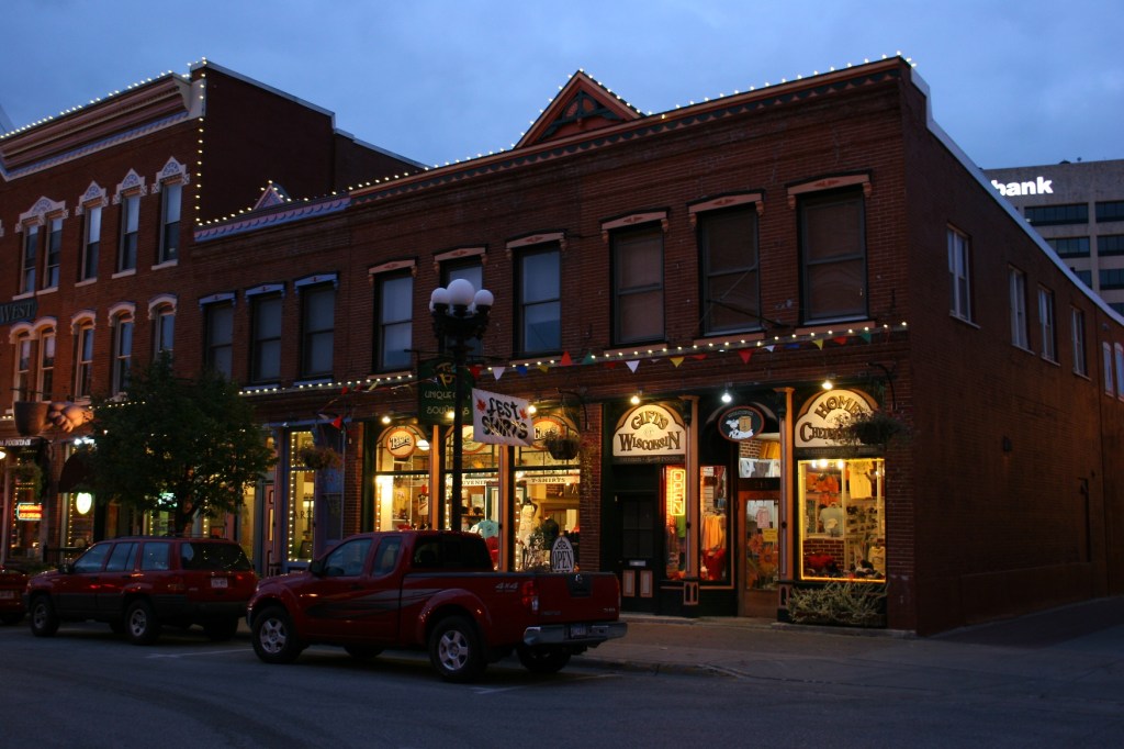 Pearl Street West includes Cheddarheads, a Wisconsin gift shop on the right in this image.