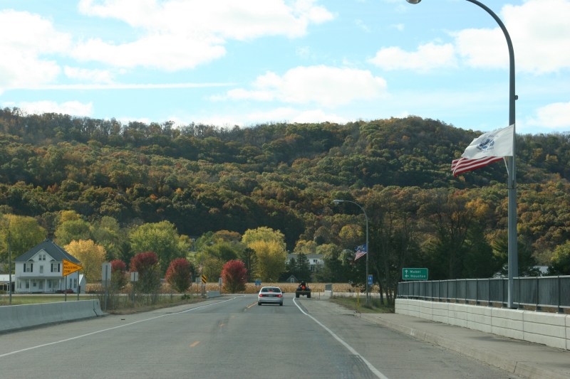 The terrain here, outside of Rushford in southeastern Minnesota, is similar to that around Houston. Turn left at the intersection and you will be headed for Houston.