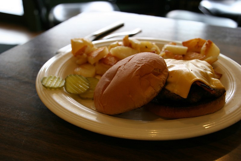 Expect basics like his hand-formed hamburger patty at Nancy's.