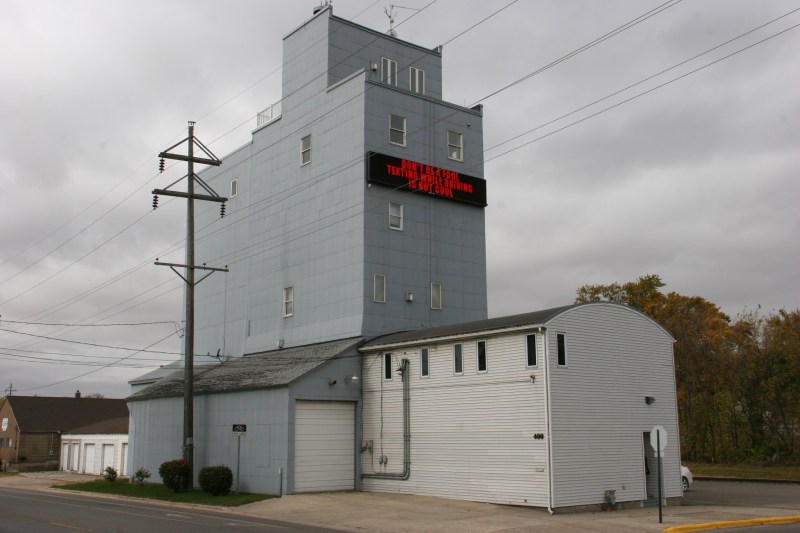 This old grain elevator has been repurposed into another use. Note the upper level balcony and windows. I asked around town. But no one could tell me what's housed here.