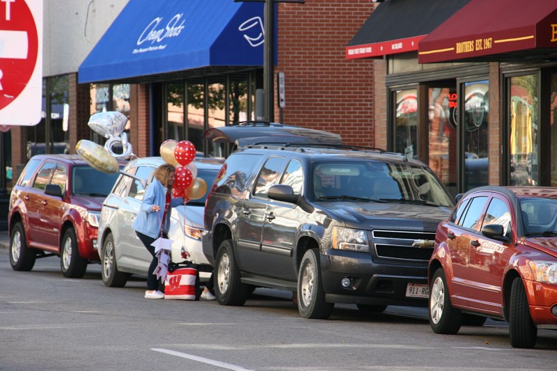 Corralling wedding balloons in downtown La Crosse.