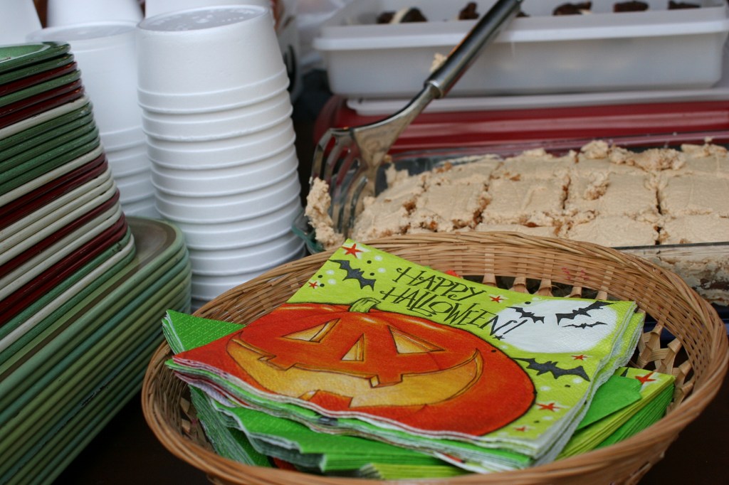 Vintage metal trays hold soup samples scooped into Styrofoam cups.