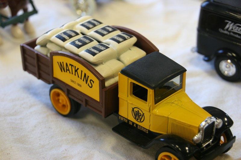 This toy truck, displayed in the museum, carries bags of spices.