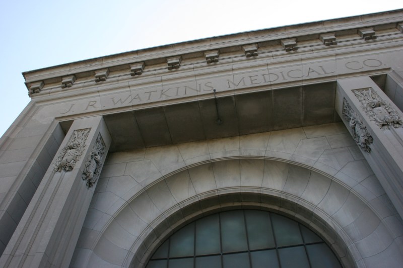 Chiseled above the main entry into the administrative building.
