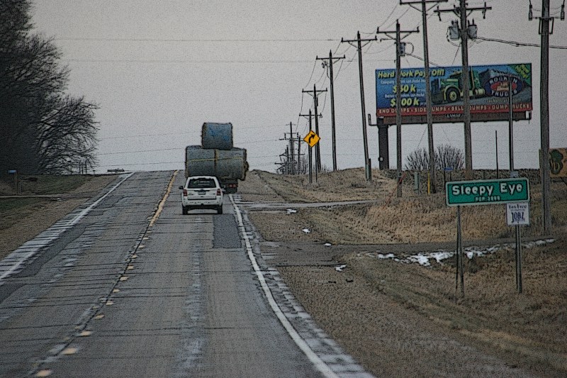 Bales on trailer, 84 going up hill